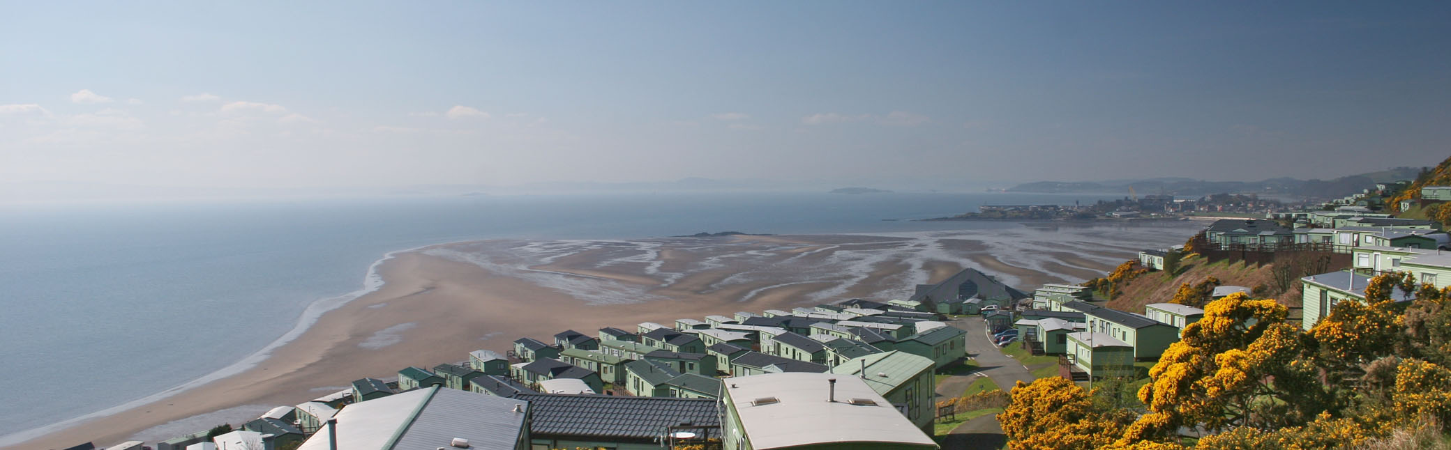 Panoramic view of Pettycur Bay Caravan Park and the golden beaches beyond.